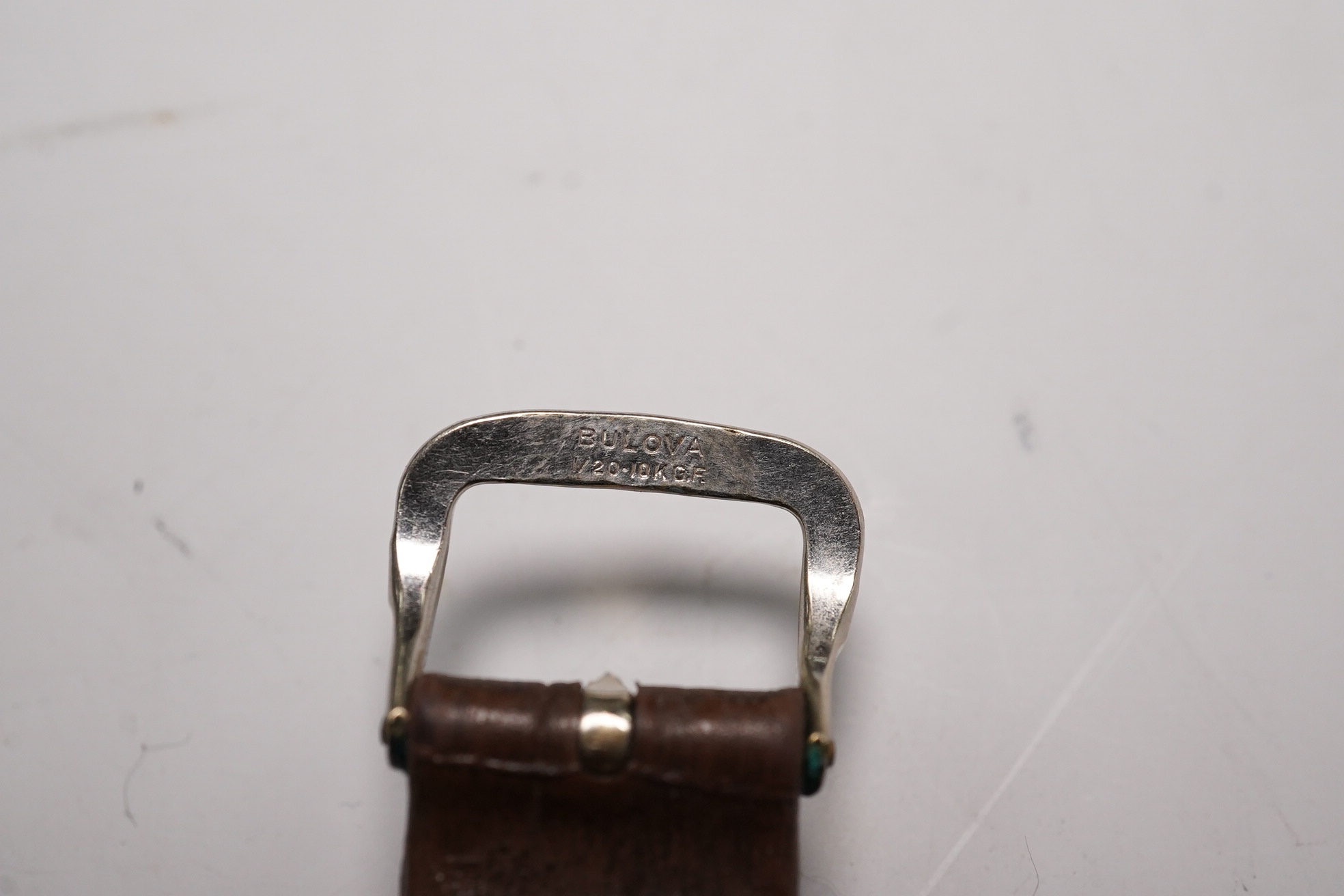A gentleman's steel Russian manual wind wrist watch, the dial inscribed Kupoba, with Arabic dial, case diameter 34mm. Condition - poor